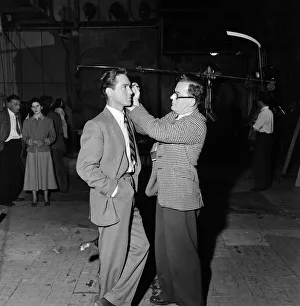 Actor Richard Todd being made up at Pinewood Studios. 1st June 1952 Actor Richard Todd being made up at Pinewood Studios. 1st June 1952