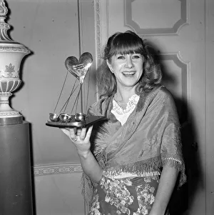 Actress Helen Mirren with her award at the Show Business Personality of 1975 as the best Actress Helen Mirren with her award at the Show Business Personality of 1975 as the best