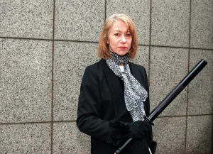 Actress Helen Mirren with a mock electric baton outside the DPP where she handed in a Actress Helen Mirren with a mock electric baton outside the DPP where she handed in a