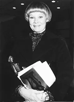 Actress Judi Dench wins best actresss award at The Standard Drama Awards for Juno Actress Judi Dench wins best actresss award at The Standard Drama Awards for Juno