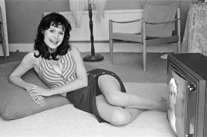 Actress Madeline Smith watching television at her flat in Kew. 6th September 1974 Actress Madeline Smith watching television at her flat in Kew. 6th September 1974