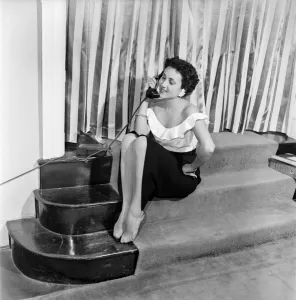 Actress Pascale Roberts talking on the telephone. October 1952 C5204-001 Actress Pascale Roberts talking on the telephone. October 1952 C5204-001