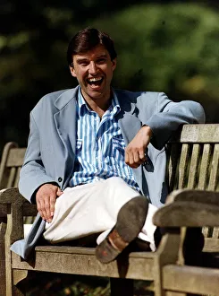 Adrian Mills TV Presenter/Actor Sitting on park bench Dbase A©Mirrorpix Adrian Mills TV Presenter/Actor Sitting on park bench Dbase A©Mirrorpix