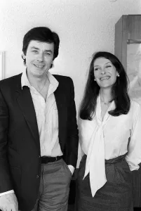 Alain Delon May 1983 french Actor with unnamed woman Alain Delon May 1983 french Actor with unnamed woman