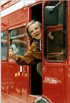 Alan Freeman Disc jockey Radio One just 65 gets in to the drivers compartment of a London Alan Freeman Disc jockey Radio One just 65 gets in to the drivers compartment of a London