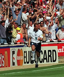 Alan Shearer of England celebrates after scoring against Scotland during the European Alan Shearer of England celebrates after scoring against Scotland during the European
