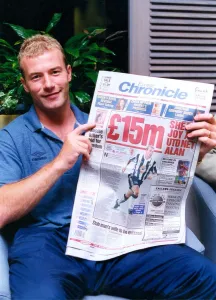 Alan Shearer making the news after signing for his boyhood club Newcastle United Alan Shearer making the news after signing for his boyhood club Newcastle United