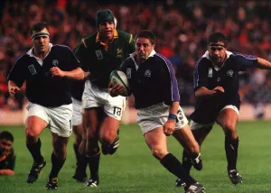 Alan Tait breaks through the South Africans to score a try for Scotland October 1999 Alan Tait breaks through the South Africans to score a try for Scotland October 1999