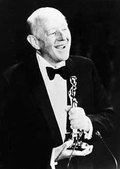 Images Dated 1st May 1980: Alec Guinness actor collects speacial award at Oscars in May 1980