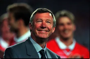 Alex Ferguson Manager of Manchester United May 1999 grins with pride at his Alex Ferguson Manager of Manchester United May 1999 grins with pride at his