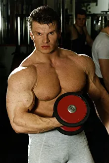 Alex Georghev one off the TV Gladiators Hawk seen in the fitness gym lifting a bar bell Alex Georghev one off the TV Gladiators Hawk seen in the fitness gym lifting a bar bell