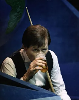 Alex Higgins snooker player during a maych drinking pint of beer Alex Higgins snooker player during a maych drinking pint of beer
