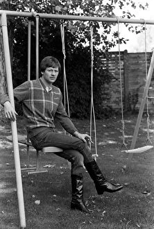 Images Dated 1st September 1983: Alex Higgins former World Snooker Champion 1983 has a swing in his garden