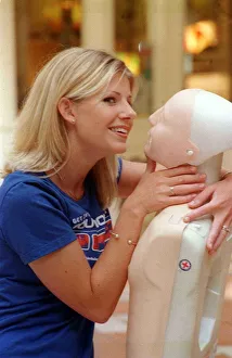 Alison Douglas TV Presenter - August 1999 Gives mouth to mouth resuscitation to a Alison Douglas TV Presenter - August 1999 Gives mouth to mouth resuscitation to a