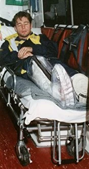 Images Dated 24th August 1994: Ally McCoist with broken leg arriving at Edinburgh Airport 1994