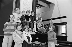 Almondbury Methodist Junior Church Christmas Party, singing carols round the piano Almondbury Methodist Junior Church Christmas Party, singing carols round the piano
