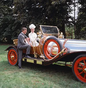 American actor Dick van Dyke and actress Ann Howes with the car which co-stars in their American actor Dick van Dyke and actress Ann Howes with the car which co-stars in their