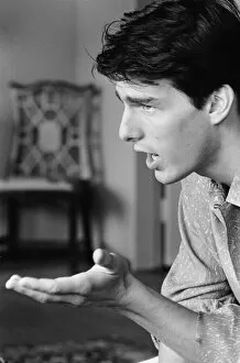 Images Dated 26th June 1986: American actor Tom Cruise answers questions during an interview in his hotel suite on a