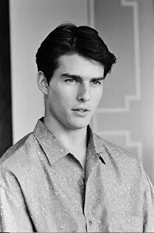 Images Dated 26th June 1986: American actor Tom Cruise answers questions during an interview in his hotel suite on a