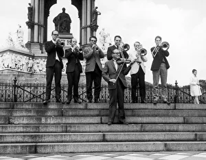 American comedian Jack Benny seeh here tuning up outside the Royal Albert Hall with American comedian Jack Benny seeh here tuning up outside the Royal Albert Hall with