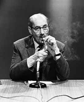 American comedy actor Groucho Marx smoking a cigar at a press conference in London American comedy actor Groucho Marx smoking a cigar at a press conference in London