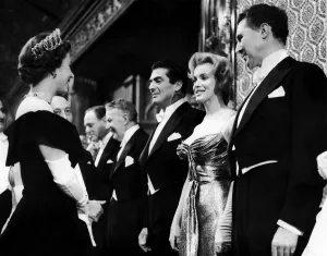 American film actress Marilyn Monroe meets Queen Elizabeth II at the Royal Command Film American film actress Marilyn Monroe meets Queen Elizabeth II at the Royal Command Film