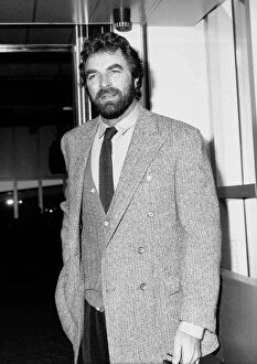 Images Dated 8th December 1990: American movie star Tom Selleck leaves London airport for Los Angeles December 1990