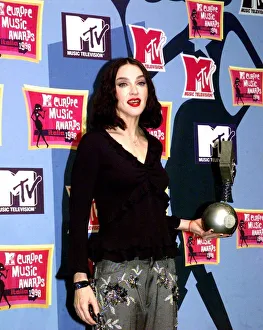 American pop star Madonna holding her award at the MTV Awards Ceremony in Milan American pop star Madonna holding her award at the MTV Awards Ceremony in Milan