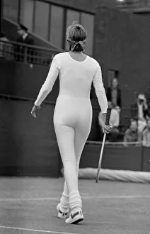 American tennis player Anne White in action wearing her white skin tight catsuit during American tennis player Anne White in action wearing her white skin tight catsuit during