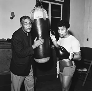American former world heavyweight boxing champion Joe Louis (left American former world heavyweight boxing champion Joe Louis (left