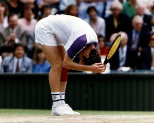Andre Agassi plays John McEnroe in the Men's Singles Semi-Final Tennis at Wimbledon Andre Agassi plays John McEnroe in the Men's Singles Semi-Final Tennis at Wimbledon