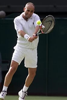 Images Dated 22nd June 1999: Andre Agassi on his way to beating Andrei Pavel in the first round of the mens singles of
