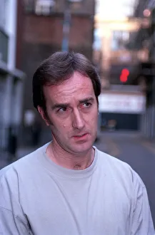 ANGUS DEAYTON WEARING T-SHIRT AND JEANS OUTSIDE SAVING HIS SOHO OFFICE IN LONDON ANGUS DEAYTON WEARING T-SHIRT AND JEANS OUTSIDE SAVING HIS SOHO OFFICE IN LONDON