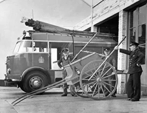 Anicient and modern fire engines stand side by side at Morpeth Fire Station Anicient and modern fire engines stand side by side at Morpeth Fire Station