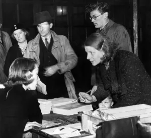 Applicants for new ration books and clothing cards at Bath Lane School, Newcastle, to-day Applicants for new ration books and clothing cards at Bath Lane School, Newcastle, to-day
