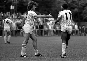 Argentina football star Mario Kempes shakes hands with Garth Crooks in a friendly game Argentina football star Mario Kempes shakes hands with Garth Crooks in a friendly game