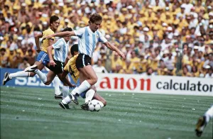 Argentina v Brazil 1982 World Cup match Calderon tackled by Luisinho Argentina v Brazil 1982 World Cup match Calderon tackled by Luisinho