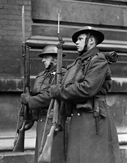 Army Sentries guard a government building in London January 1942 Army Sentries guard a government building in London January 1942