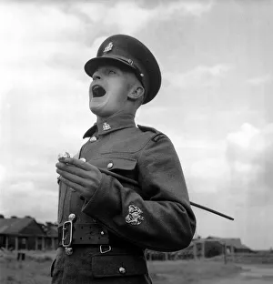 Army: Soldiers: Communication Sergeant Major Harold Kennard seen here shorting commands Army: Soldiers: Communication Sergeant Major Harold Kennard seen here shorting commands
