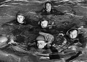 Army Traning: Swimming in full back. March 1941 P014906 Army Traning: Swimming in full back. March 1941 P014906