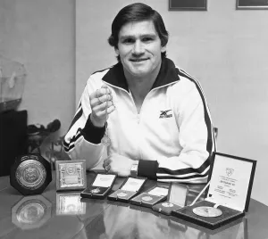 Arsenal footballer Pat Rice shows off his trophies, February 1983 Arsenal footballer Pat Rice shows off his trophies, February 1983