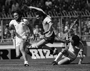 Images Dated 10th May 1980: Arsenals Liam Brady is brought down earth with Lampard blocking the way