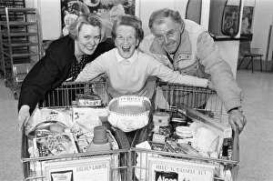 Images Dated 11th December 1991: ASDA trolley dash winner Marjorie Stansfield pictured with Susan Wilkinson of ASDA