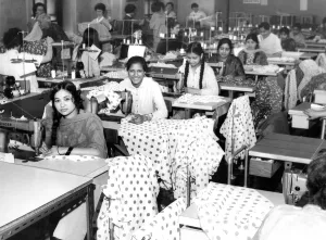 Asian girl workers at their machines in the factory of S. Levine and Co Asian girl workers at their machines in the factory of S. Levine and Co
