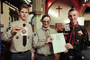 Assistant County Commissioner David Clark (centre) congratulates scouts Paul Barker (l Assistant County Commissioner David Clark (centre) congratulates scouts Paul Barker (l