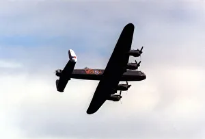 An Avro Lancaster bomber aircraft of the Battle of Britain Memorial Flight flies past An Avro Lancaster bomber aircraft of the Battle of Britain Memorial Flight flies past