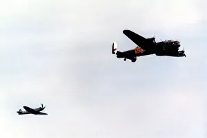 An Avro Lancaster bomber and Supermarine Spitfire fighter aircraft of the Battle of An Avro Lancaster bomber and Supermarine Spitfire fighter aircraft of the Battle of