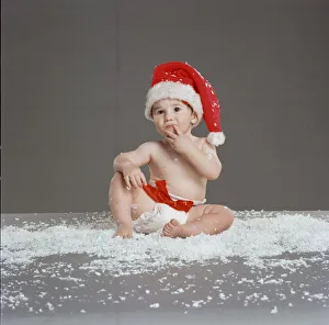 Baby wearing Christmas Hat, Circa December 1997 Baby wearing Christmas Hat, Circa December 1997