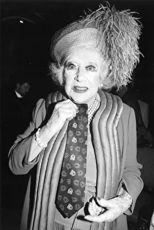 Barbara Cartland Author of Romantic Novels shows off a tie presented to Dame Barbara Barbara Cartland Author of Romantic Novels shows off a tie presented to Dame Barbara