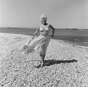 Barbara Windsor, Actress, 7th July 1976. Pictured, taking a break from an unusual role Barbara Windsor, Actress, 7th July 1976. Pictured, taking a break from an unusual role